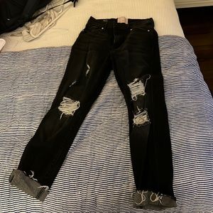 Distressed black revice jeans